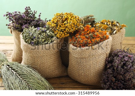 Various dried medical herbs and flowers, and herbal tea