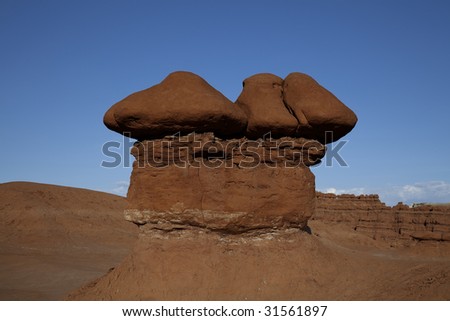 View of red rock formations in San Rafael Swell,Goblin Valley with blue skys the and clouds