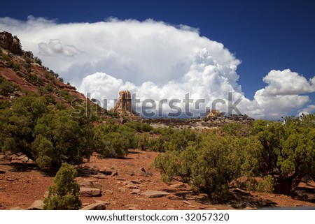 View of red rock formations in San Rafael Swell with blue sky\'s the and clouds