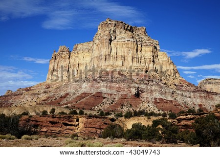 View of the red rock formations in San Rafael Swell with blue sky?s and clouds