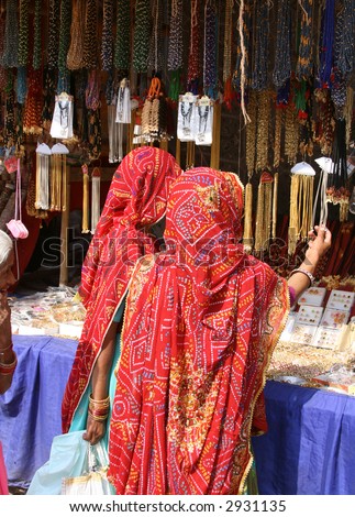 Women in saris at Indian market, Pushkar Camel Fair