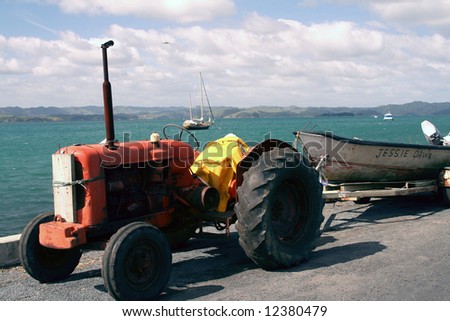 Old tractor and boat, New Zealand
