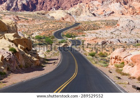 Winding road in colorful desert landscape, Valley of Fire State Park, NV.