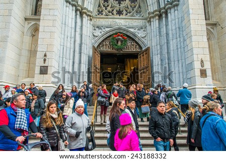 NEW YORK, NEW YORK - DECEMBER 25: Many people in the front door of St. Patrick\'s Cathedral on December 25, 2014, Christmas, in Midtown of Manhattan.