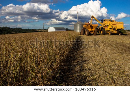 PARANA, BRAZIL - FEBRUARY 27, 2013: Mechanized harvesting at a soybean farm in the district of Sao Luiz, county of Londrina