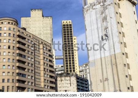 SAO PAULO, BRAZIL, APRIL 30, 2014. Building maintenance: Man working at height