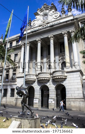 SAO PAULO, BRAZIL, JUNE 05, 2014: facade of the USP-Sao Francisco law school and sculpture Eternal Kiss (beijo eterno) in downtown Sao Paulo