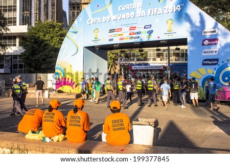 SAO PAULO, BRAZIL - June 16, 2014: Soccer fans during the World Cup Group in the arena FIFA fan fest on Anhangabau Valley