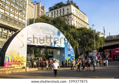 SAO PAULO, BRAZIL - June 16, 2014: Soccer fans during the World Cup Group in the arena FIFA fan fest on Anhangabau Valley