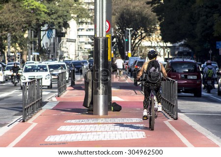 Sao Paulo, Brazil, SP, August 10, 2015. Bicycle path in Paulista Avenue. This is one of the most important thoroughfares of the city of Sao Paulo, one of the main financial centers of the city