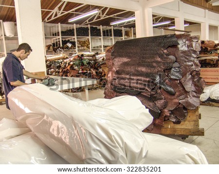 Sao Paulo, Brazil, november 08, 2004. Workers at leather factory perform the work