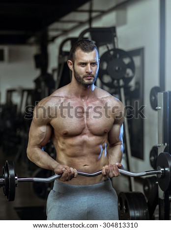 Man doing weight lifting in gym