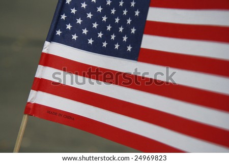 Made In China printed on a paper American Flag.