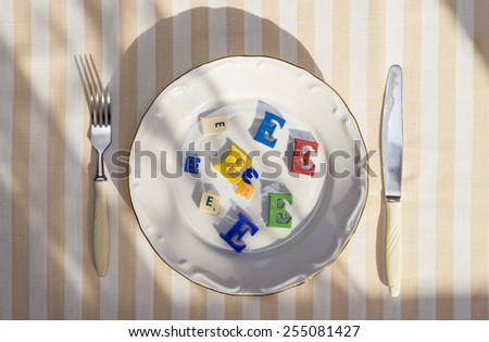 Plate with unhealthy foods with preservatives