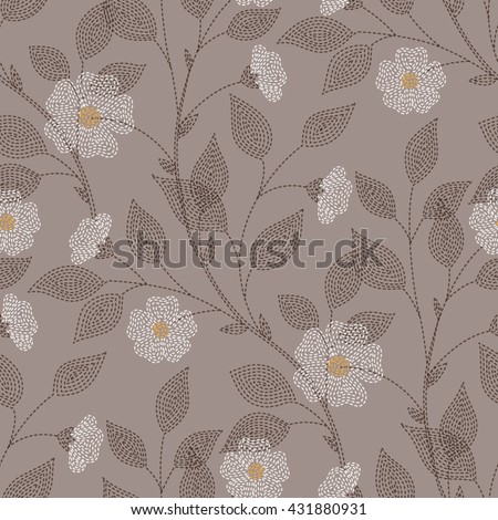 Embroidered flowers and leaves on brown background. Seamless pattern for your design