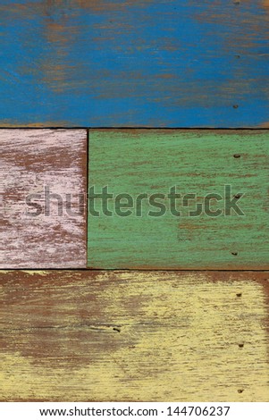 detail of abstract art color wood wall    yellow green blue purple