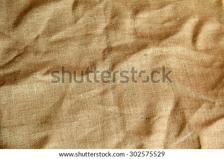 texture of brown burlap background wrinkle cloth for copy space