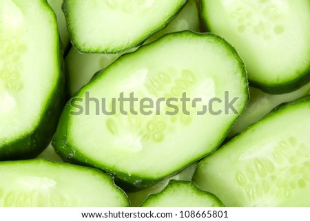 Fresh sliced cucumbers background