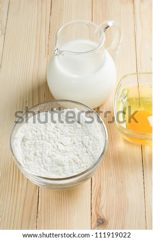 Basic ingredients for dough. Milk, eggs and flour.