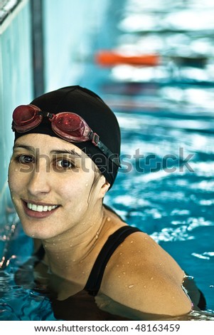 Swimming female smiling and gazing