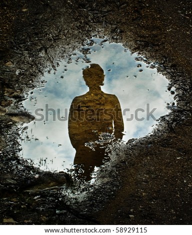 Through the Looking Glass, reflection on a water puddle