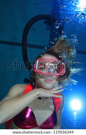 Female scuba diver out of air
