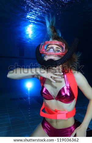 Female scuba diver out of air