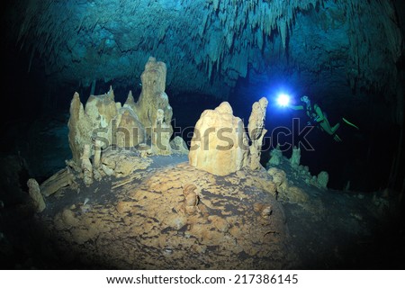 Cave diving in the cenote underwater cave at the yucatan peninsula of mexico