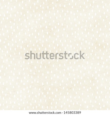 Seamless hand-drawn spotted pattern on paper texture. Abstract background