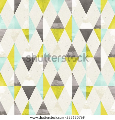 Seamless harlequin pattern on paper texture. Geometric background