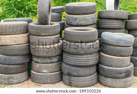 Pile of old car tires for rubber recycling