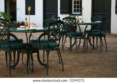 Coffee Shop Tables  Chairs on Garden Coffee Shop With Metal Tables And Chairs On A Warm Summer Day