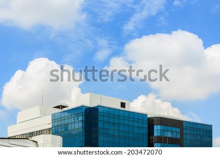 Modern building on blue sky background