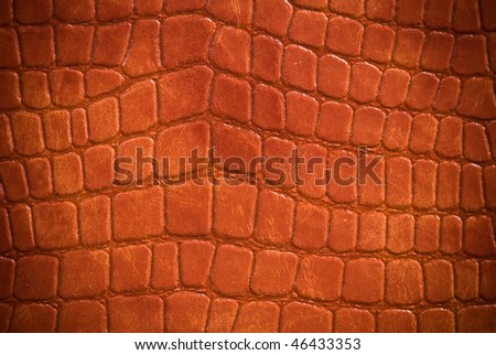 Brown corrugated leather surface (vignetted)