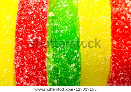 Colored marmalade roll with sugar