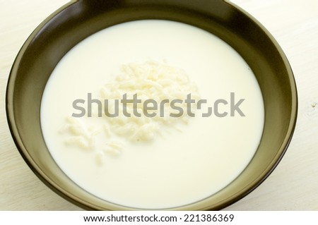 Milk soup with rice cereal in a bowl