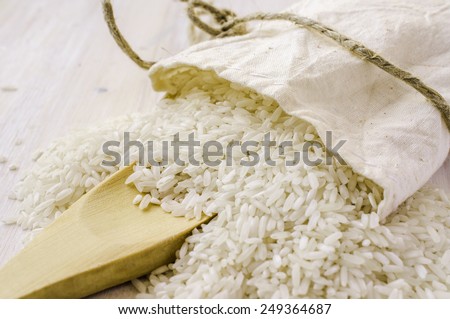 Long grain rice in bulk sack with a shovel