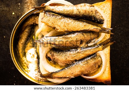 Tapas with sardines or sprats on canned fish