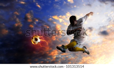 soccer player kicking the ball