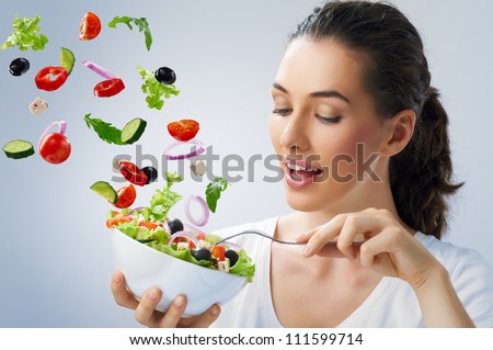 A beautiful girl eating healthy food A beautiful girl eating healthy food