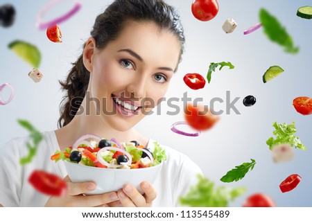 A beautiful girl eating healthy food A beautiful girl eating healthy food