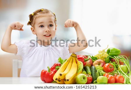 A beautiful girl eating fresh fruit A beautiful girl eating fresh fruit