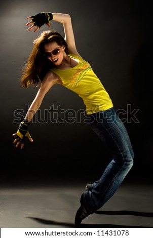 a young nice girl dancing modern dances