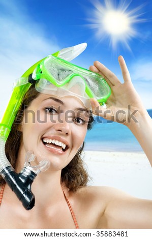 beautiful girl with snorkel on white background