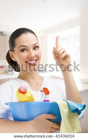 Young girl with a pack of detergents
