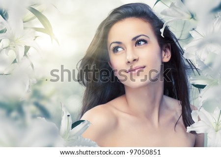 a beautiful girl in the flower garden