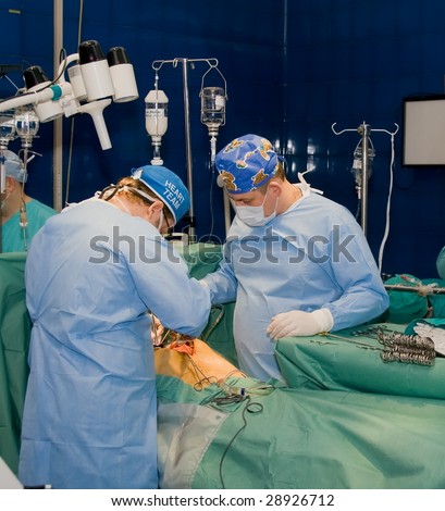 The command of surgeons spends operation on the heart