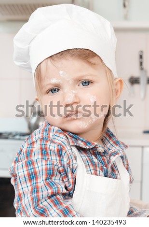 Portrait of a little chef hat and apron