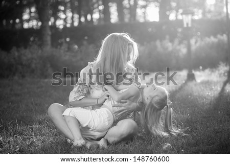 mother and daughter sitting together