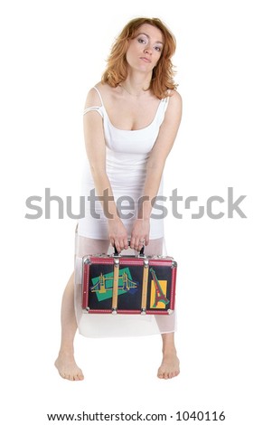 funny retro portrait of a beautiful woman with old luggage